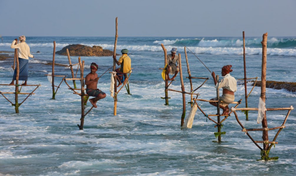 Рыбаки на шестах Унаватуна